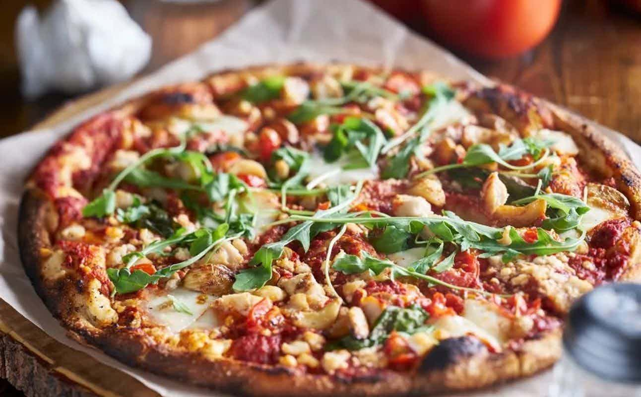 Enjoy Pizza, Italian, Dairy free options, Gluten Free options, Vegan options, Vegetarian options, Restaurant, Indoor & outdoor seating, Table service, $$, Families and Groups cuisine at Stoked Pizza Helensvale in Helensvale, Gold Coast